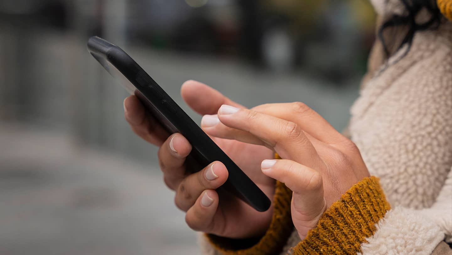 Woman holding a smartphone