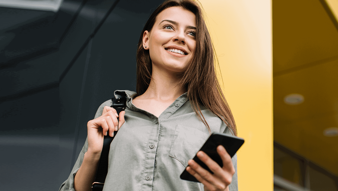 Woman with smartphone looking at front