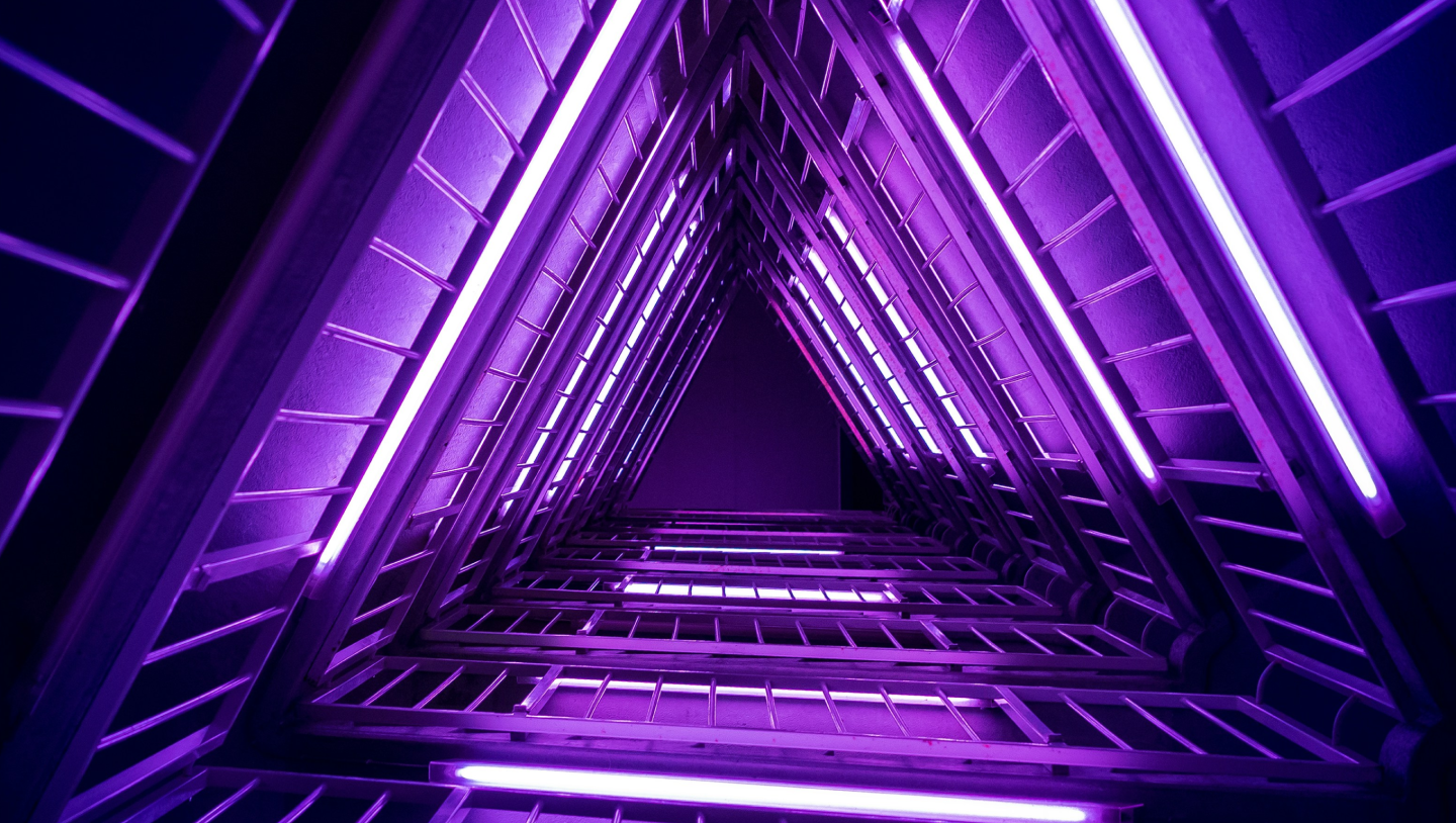 Purple triangular light installation perspective for open banking trends hero