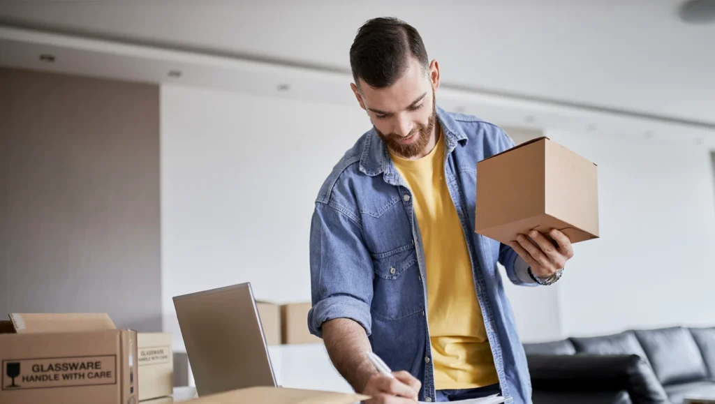 Man preparing a parcel