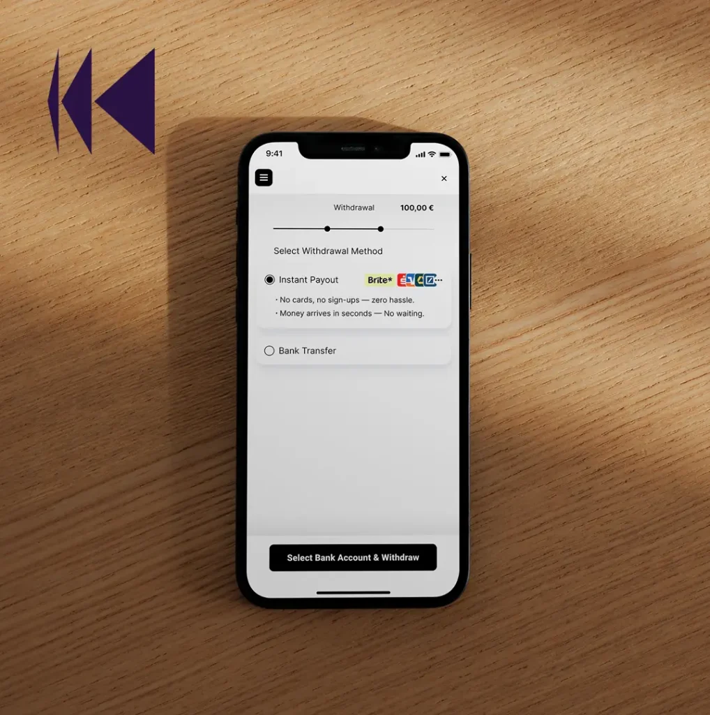A mobile phone with Brite Instant Payouts sitting on a wooden table with the reverse payout symbol in the top left
